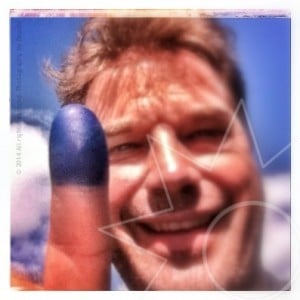 Pascal shows off his blue finger tip, proud of all his afghan friends that voted in the election in Afghanistan today!